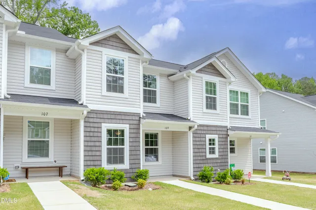 front view of a house and a yard