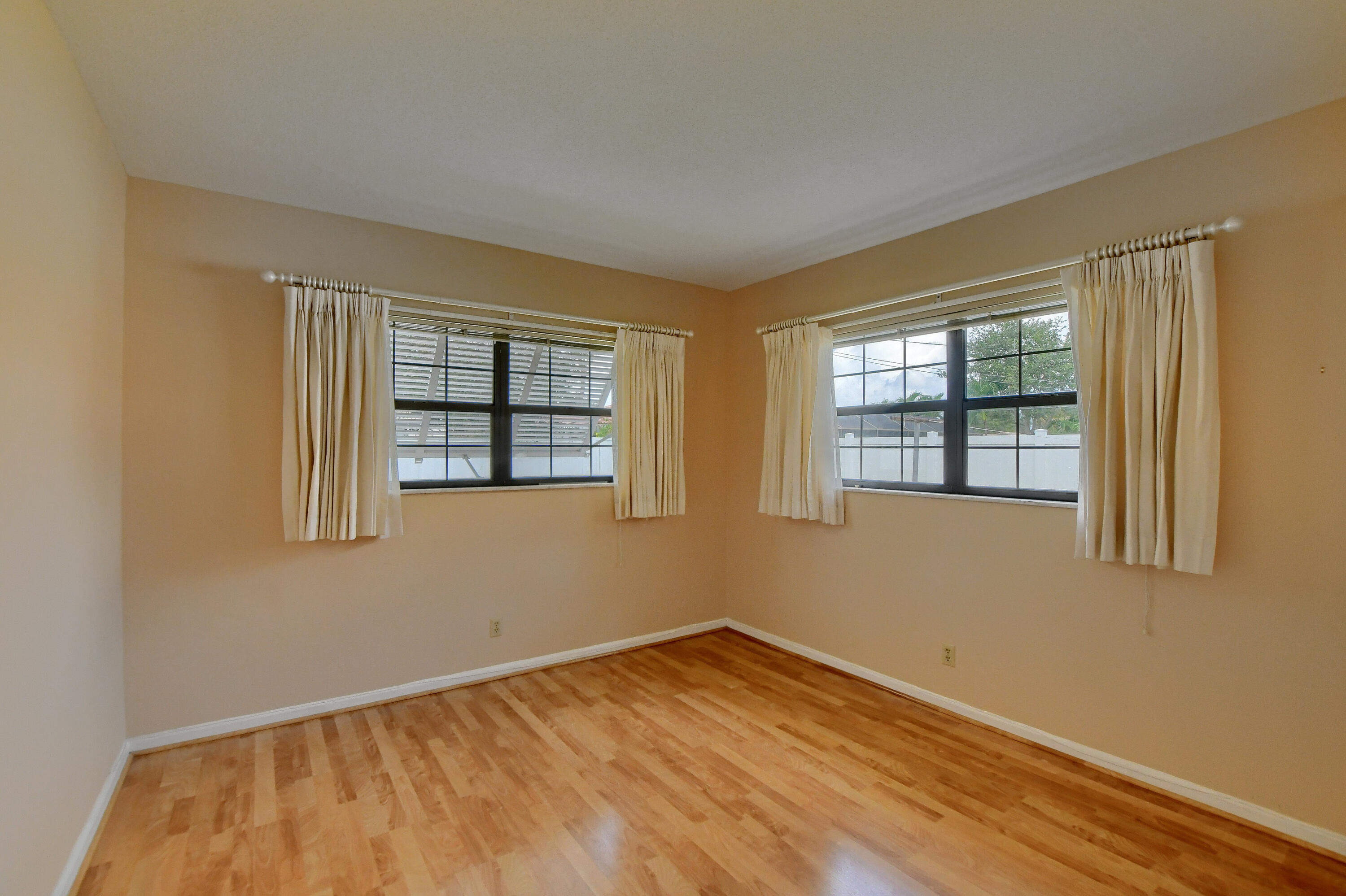 251 Southwest 9th Avenue Boca Raton, FL 33486 - Photo 20 of 37 a view of an empty room with a window