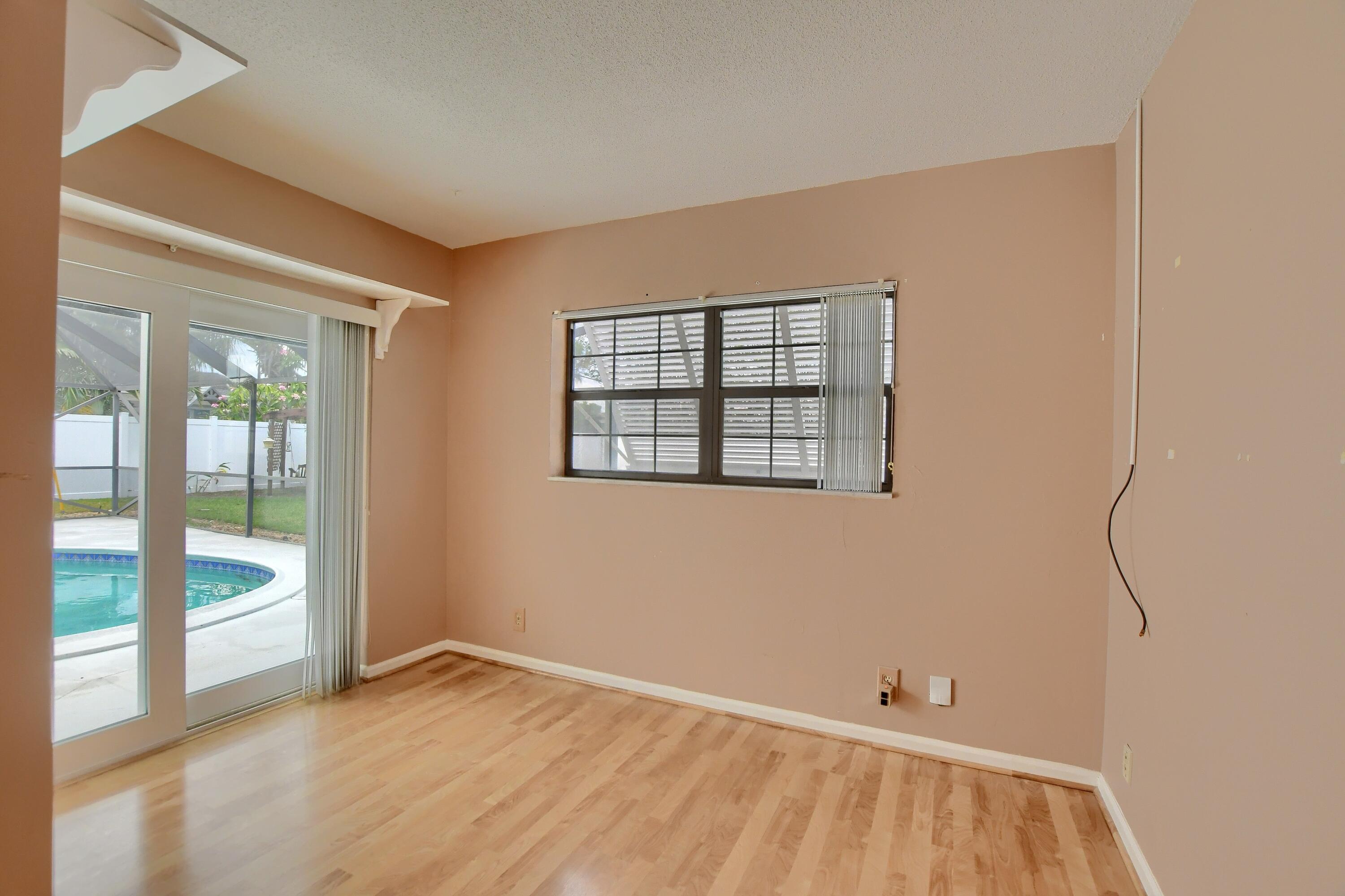 251 Southwest 9th Avenue Boca Raton, FL 33486 - Photo 24 of 37 an empty room with glass door