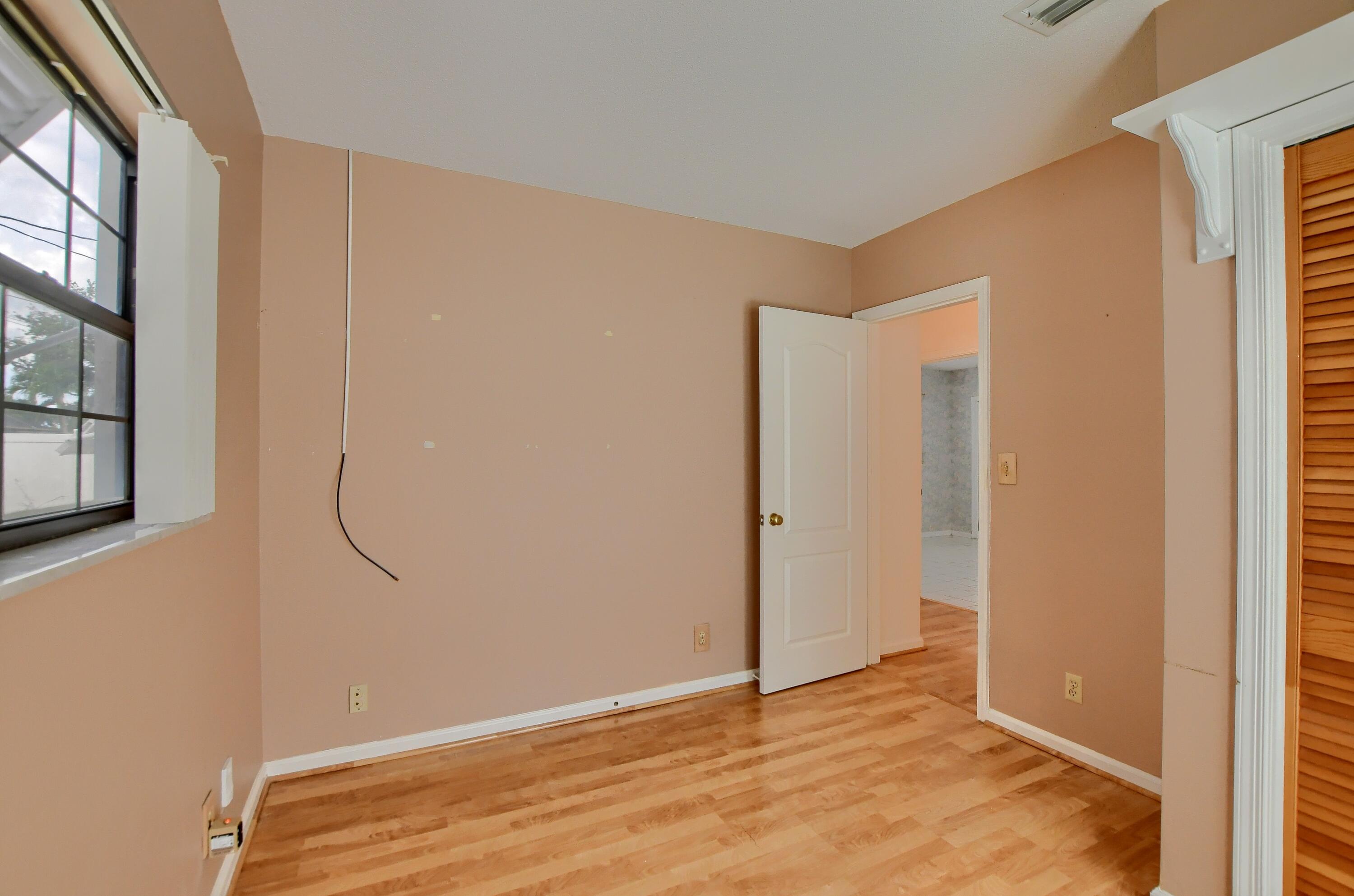 251 Southwest 9th Avenue Boca Raton, FL 33486 - Photo 25 of 37 a room that has a closet in it