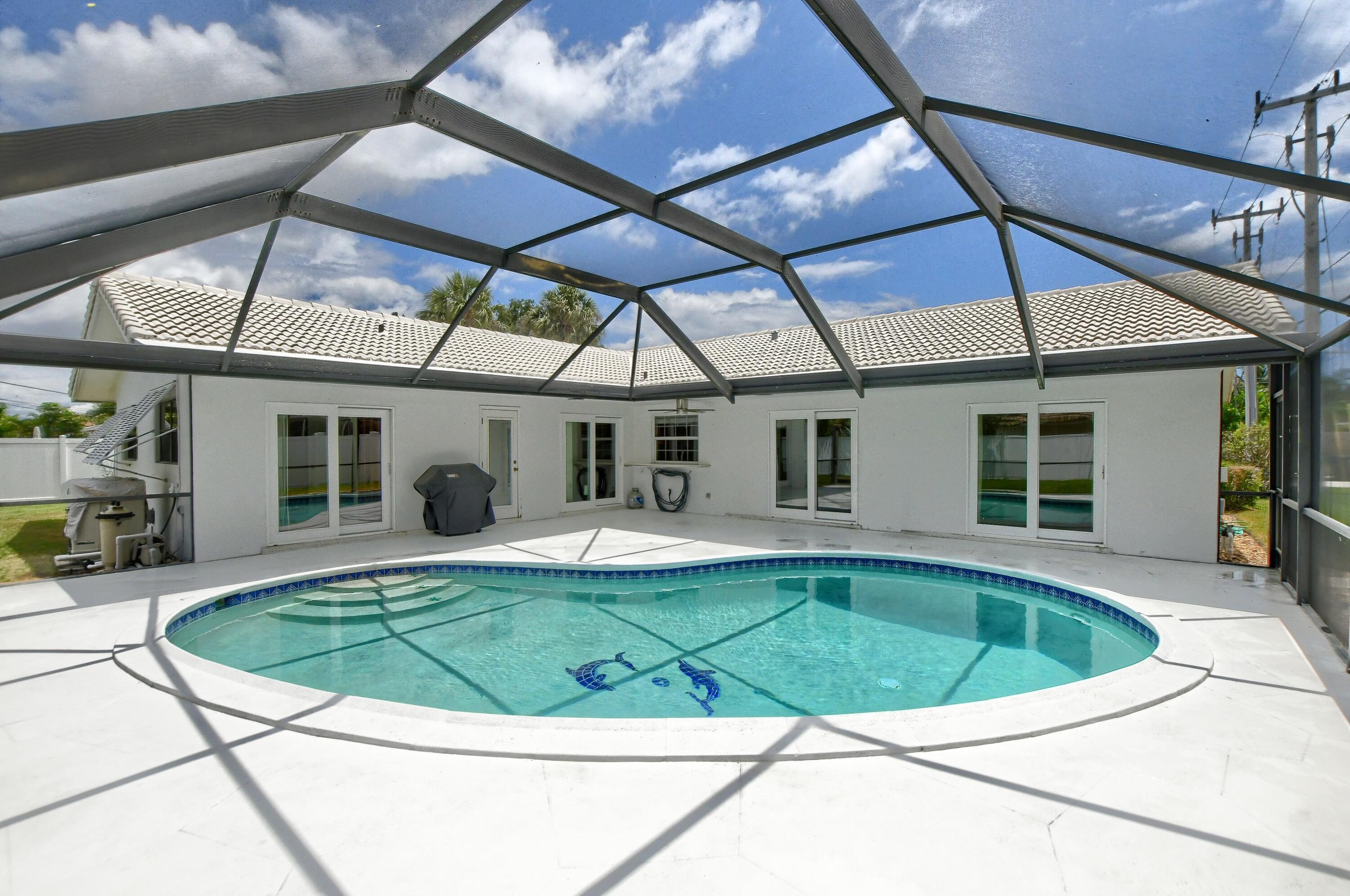 251 Southwest 9th Avenue Boca Raton, FL 33486 - Photo 28 of 37 a view of a house with swimming pool