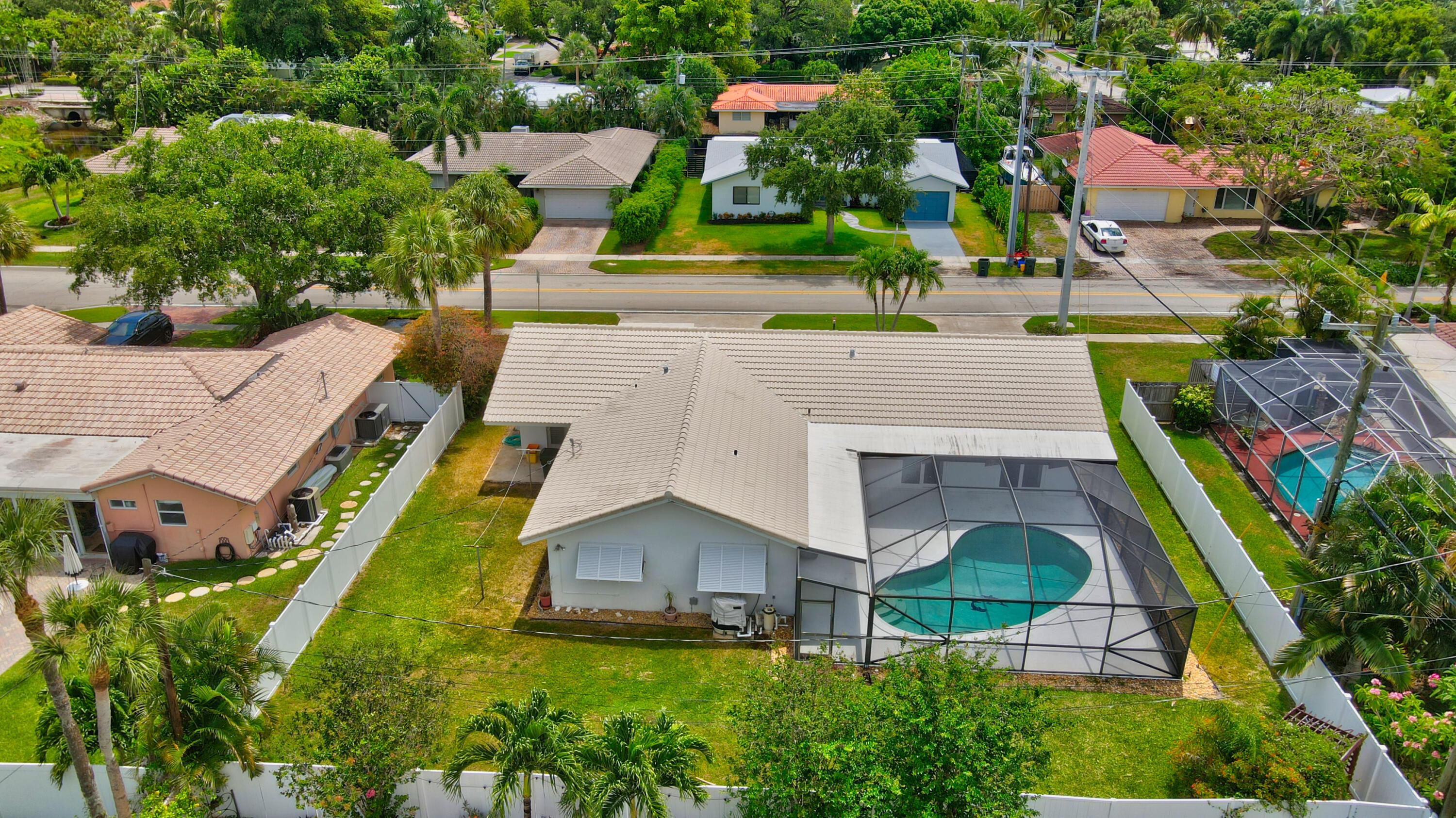 251 Southwest 9th Avenue Boca Raton, FL 33486 - Photo 33 of 37 an aerial view of multiple houses with a yard