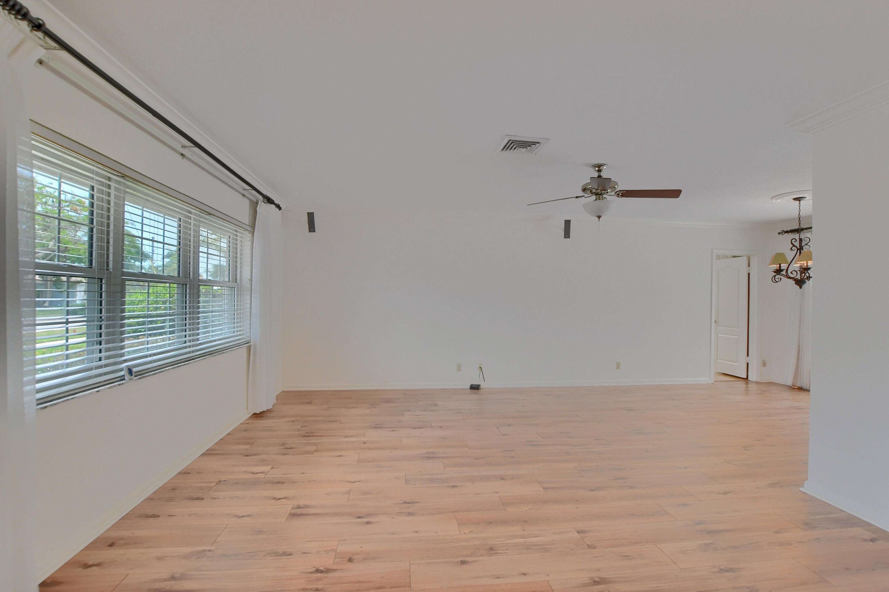 251 Southwest 9th Avenue Boca Raton, FL 33486 - Photo 4 of 37 a view of an empty room with a window