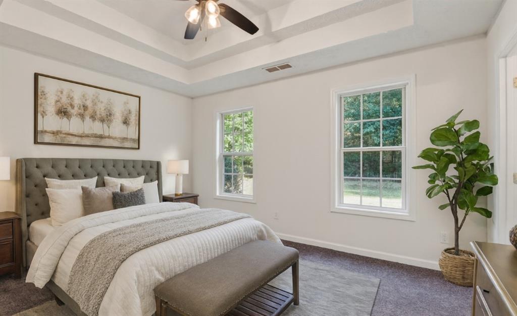 110 Chestnut Drive Covington, GA 30016 - Photo 11 of 27 a bedroom with bed and a window