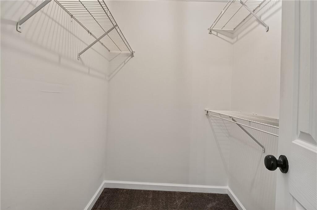 110 Chestnut Drive Covington, GA 30016 - Photo 15 of 27 a view of small space with racks on the wall