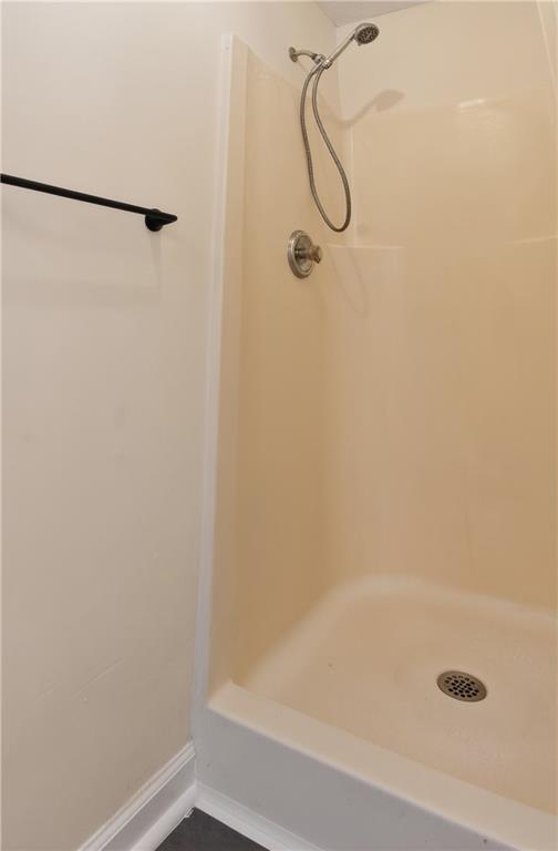 110 Chestnut Drive Covington, GA 30016 - Photo 19 of 27 a bathroom with a shower and a shower