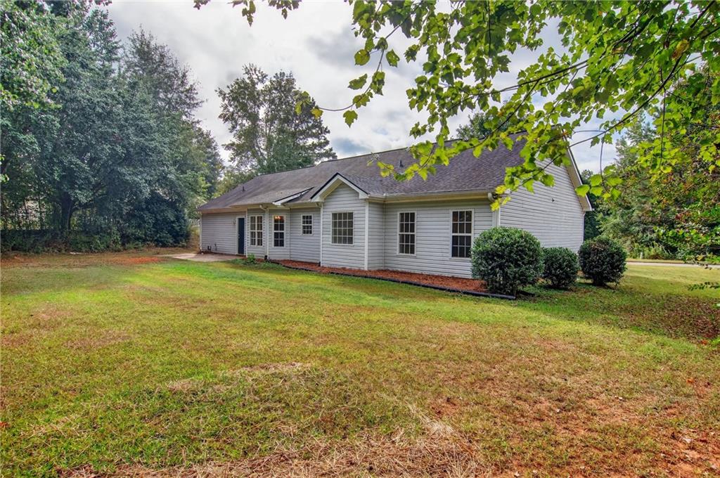 110 Chestnut Drive Covington, GA 30016 - Photo 27 of 27 a front view of a house with garden