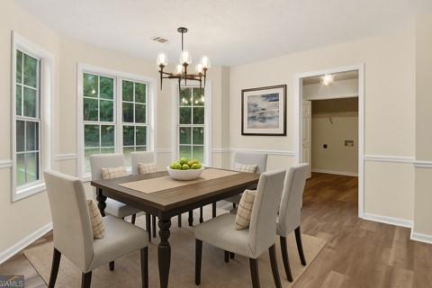 110 Chestnut Drive Covington, GA 30016 - Photo 7 of 27 a view of a dining room with furniture window and outside view