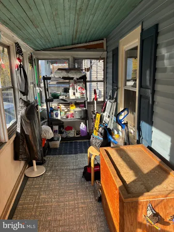 a kitchen with a stove and a table