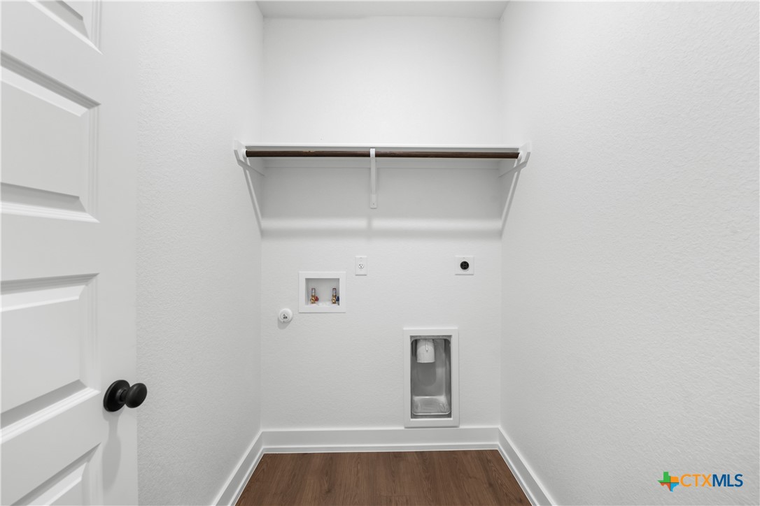 1210 Cilantro Road Temple, TX 76501 - Photo 16 of 16 a view of small space with racks on the wall