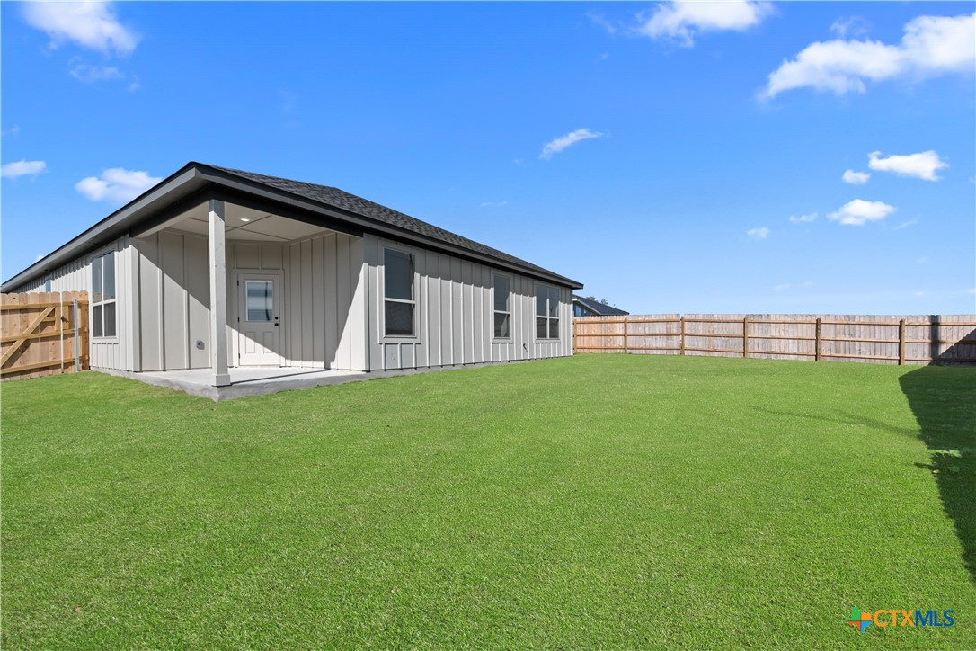1210 Cilantro Road Temple, TX 76501 - Photo 2 of 16 a view of a backyard with a garden