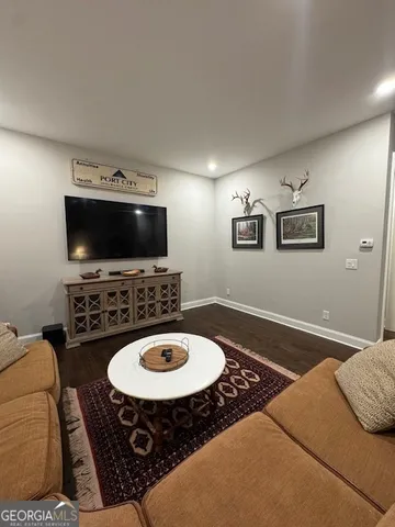 a living room with furniture and a couch