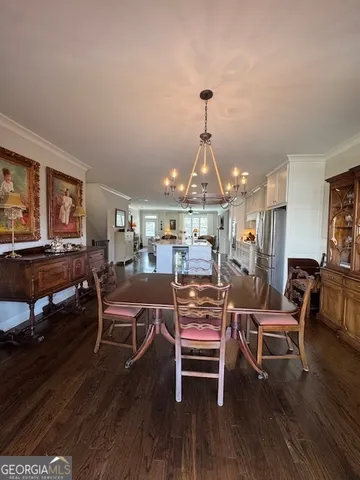 a view of a livingroom with furniture and wooden floor