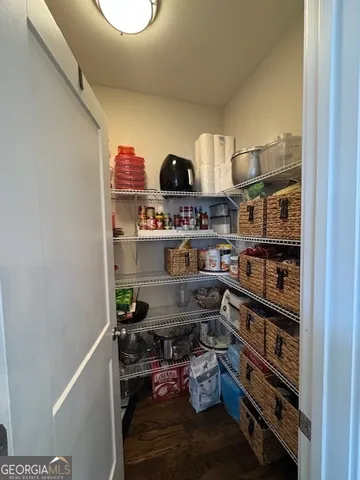 a room with storage and utility