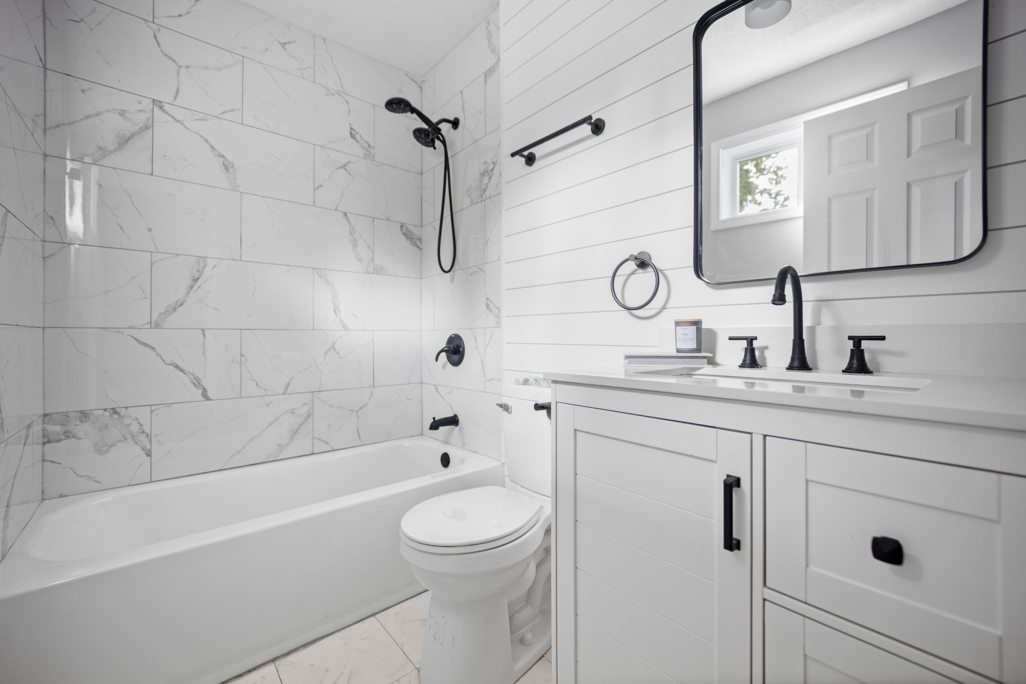 712 Westside Drive Tullahoma, TN 37388 - Photo 14 of 28 a bathroom with a granite countertop sink a toilet and shower