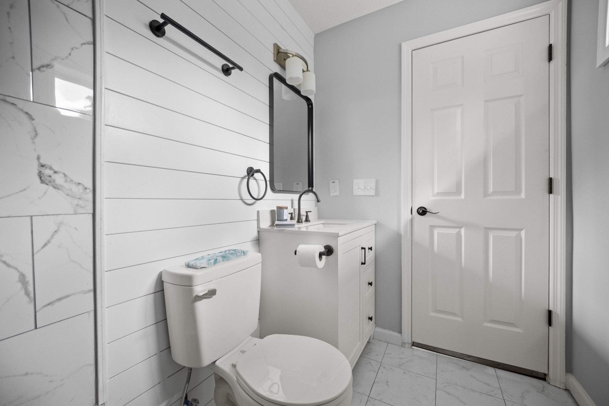 712 Westside Drive Tullahoma, TN 37388 - Photo 15 of 28 a bathroom with a sink a toilet a mirror and shower