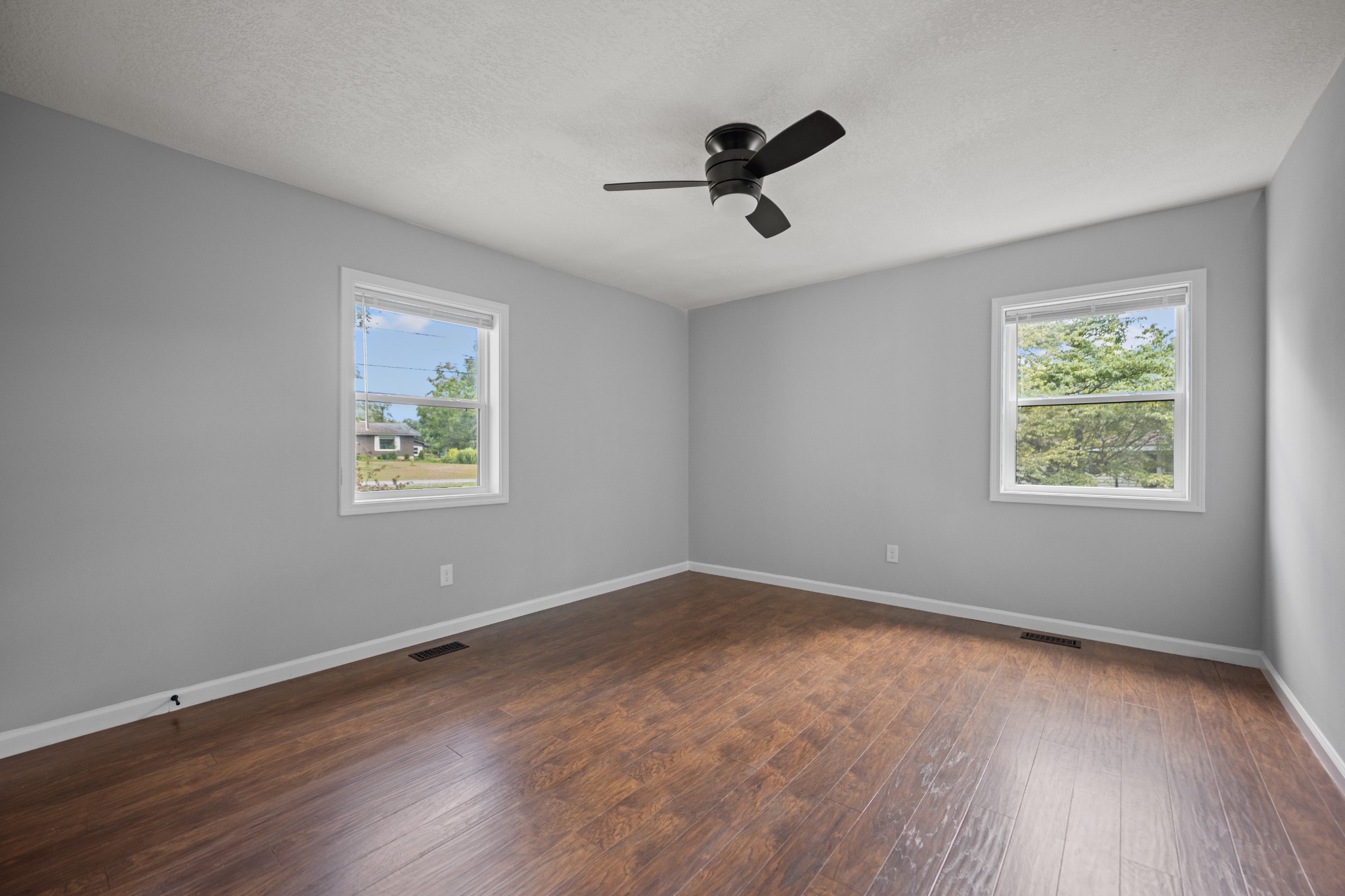 712 Westside Drive Tullahoma, TN 37388 - Photo 16 of 28 a view of room with hardwood floor and window