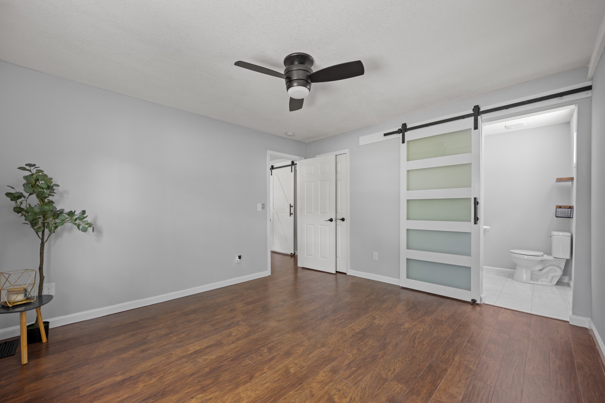 712 Westside Drive Tullahoma, TN 37388 - Photo 19 of 28 a view of an empty room with a window and wooden floor