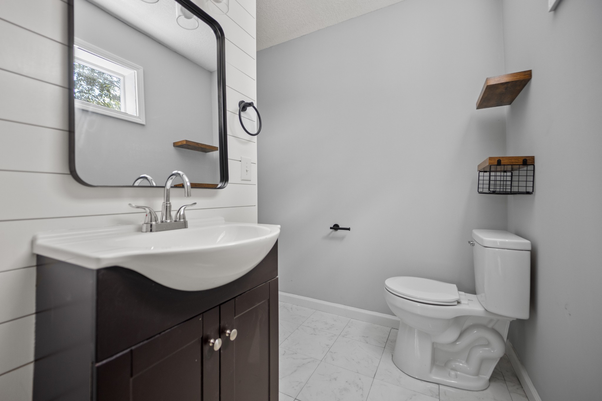 712 Westside Drive Tullahoma, TN 37388 - Photo 20 of 28 a bathroom with a sink toilet and a mirror