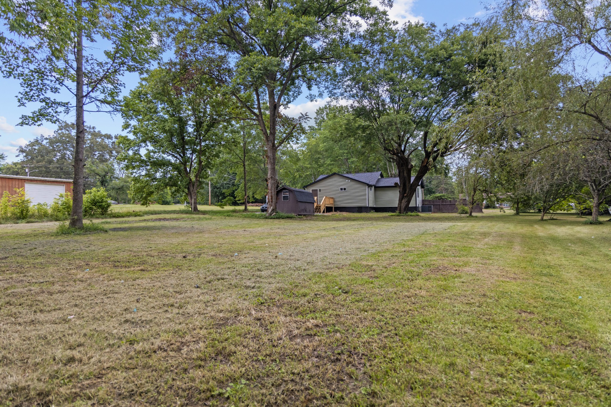712 Westside Drive Tullahoma, TN 37388 - Photo 26 of 28 a view of pool and trees in the background