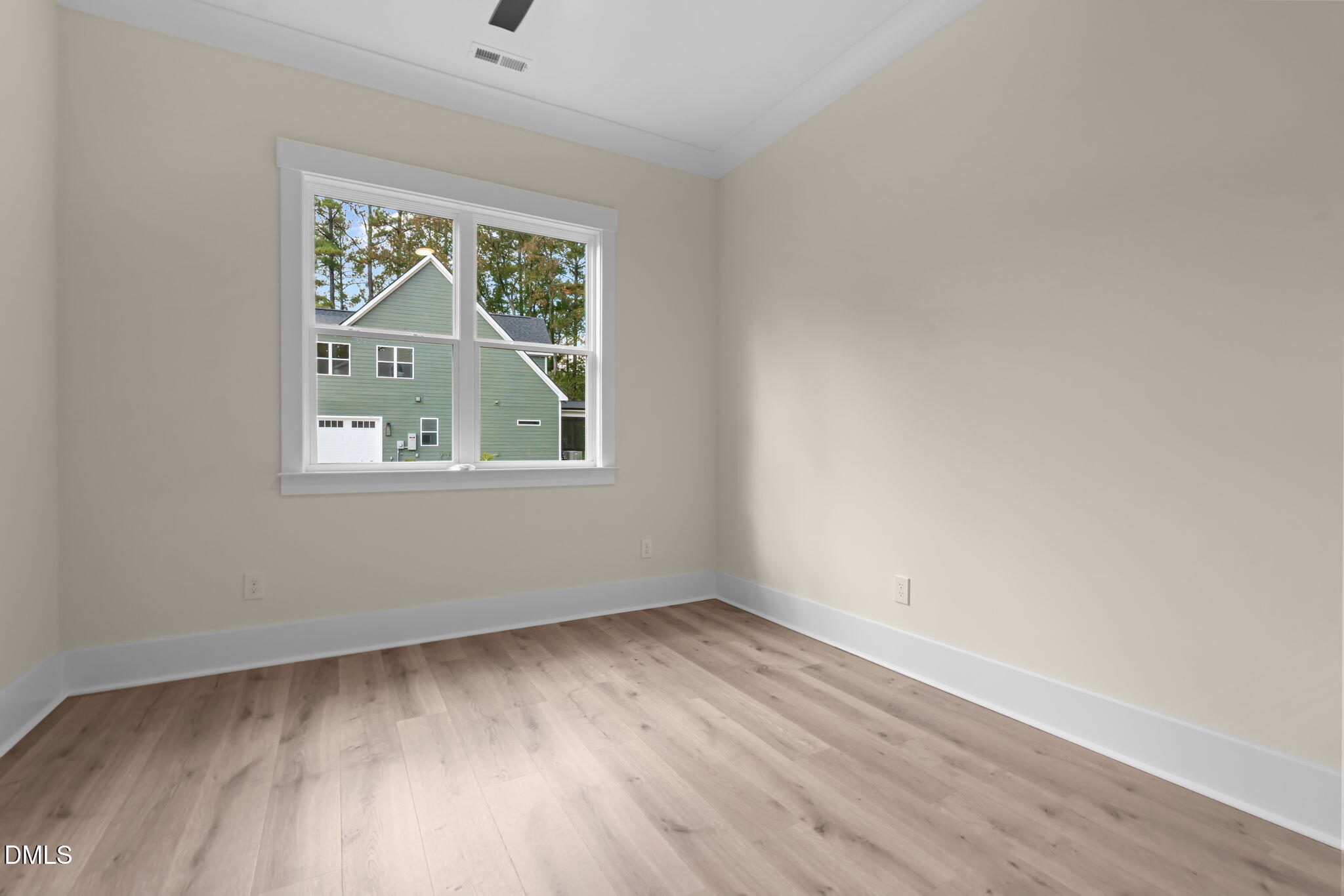 188 Landon Ridge Sanford, NC 27330 - Photo 13 of 44 wooden floor in an empty room with a window