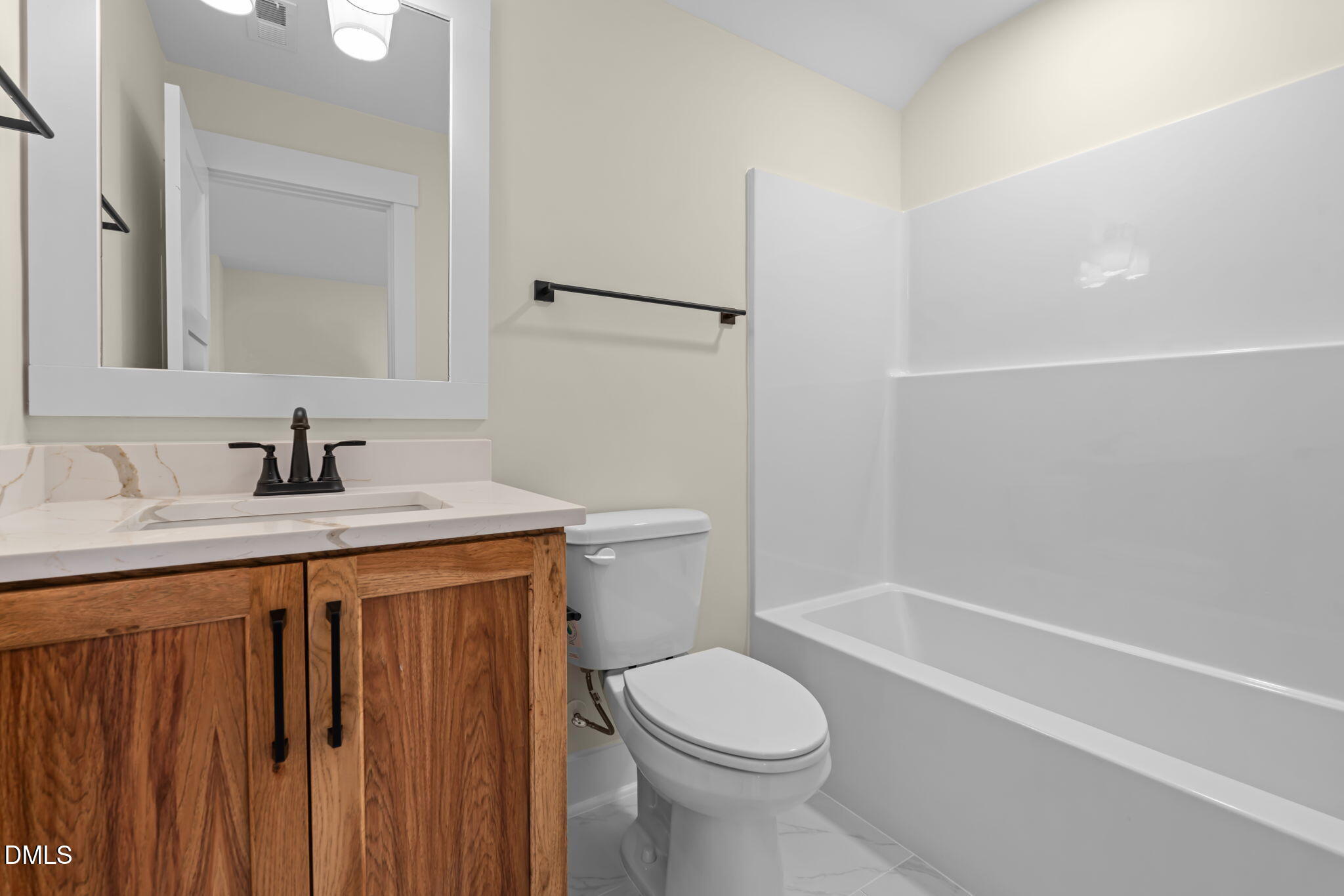 188 Landon Ridge Sanford, NC 27330 - Photo 14 of 44 a bathroom with a sink a toilet and shower