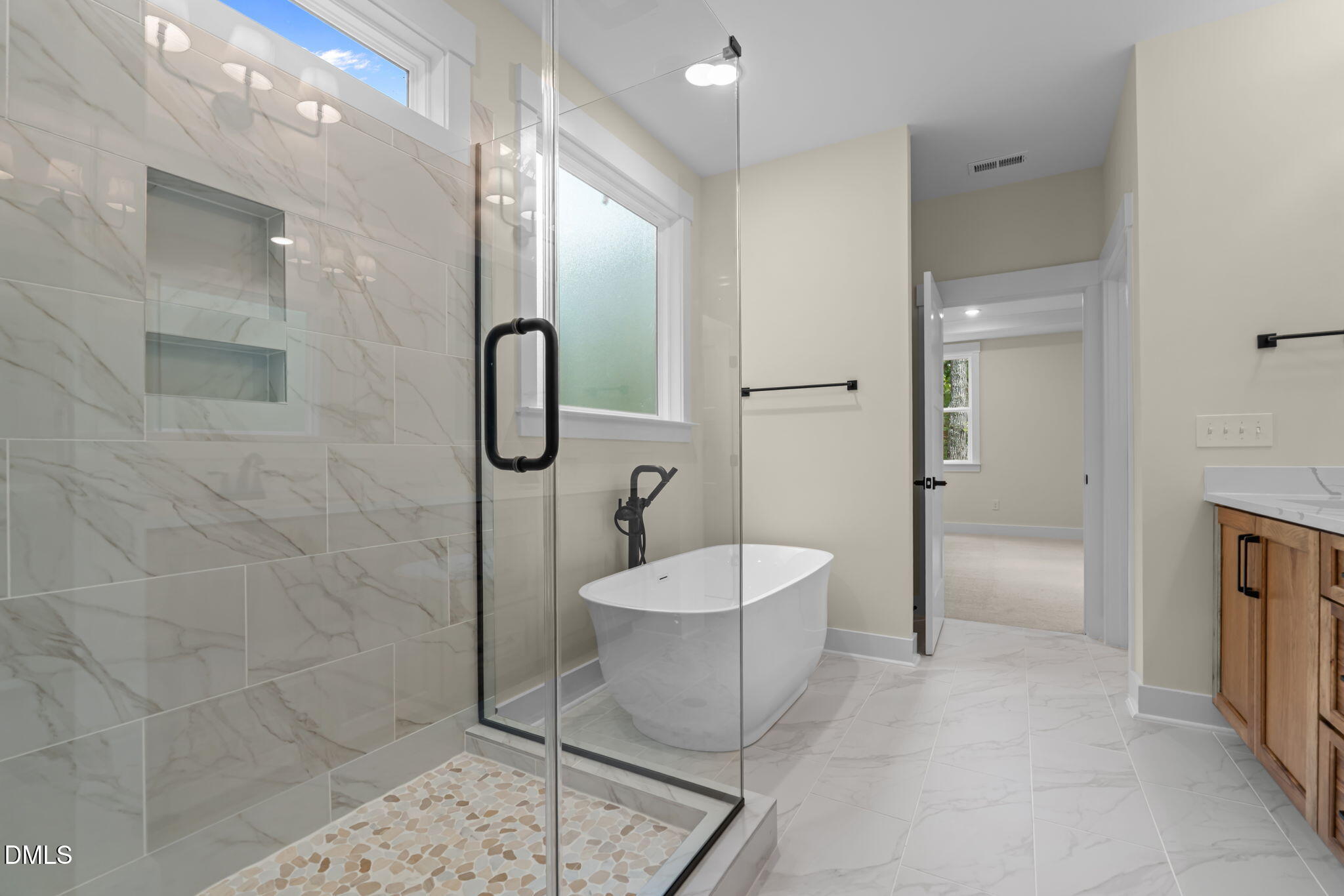 188 Landon Ridge Sanford, NC 27330 - Photo 27 of 44 a spacious bathroom with a granite countertop sink a toilet and shower