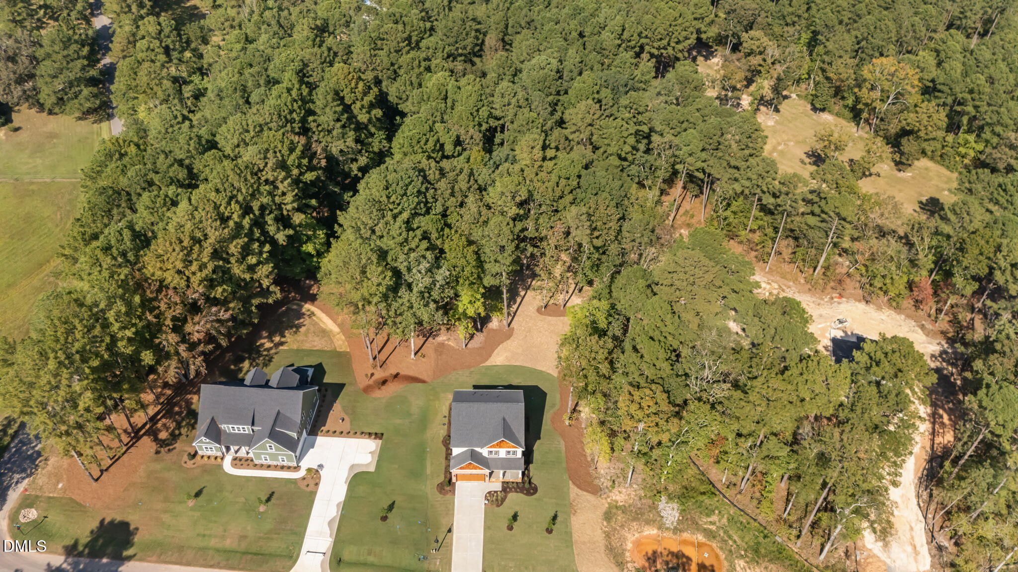 188 Landon Ridge Sanford, NC 27330 - Photo 44 of 44 a view of a patio with table and chairs and potted plants
