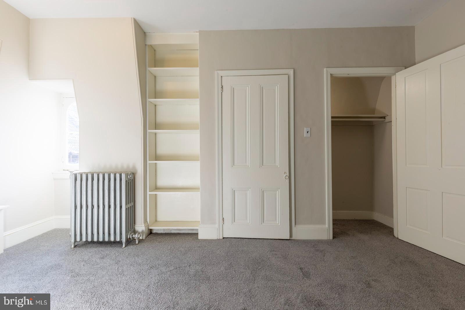 3604 Baring Street, Unit 2 Philadelphia, PA 19104 - Photo 12 of 25 an empty room with closet area