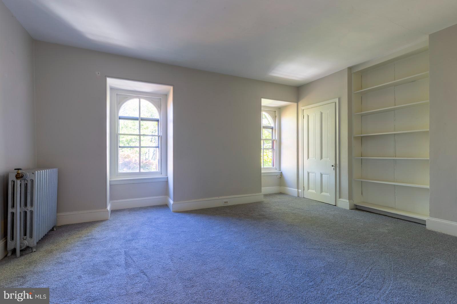 3604 Baring Street, Unit 2 Philadelphia, PA 19104 - Photo 13 of 22 an empty room with a window