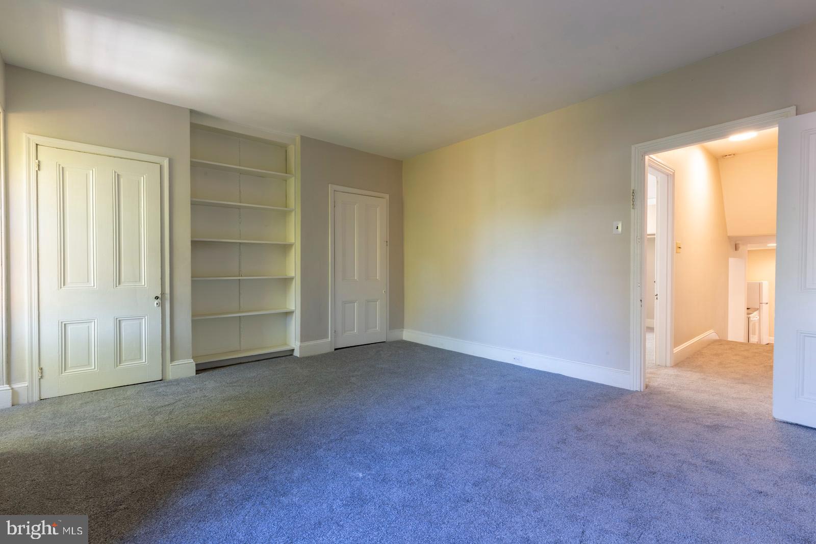 3604 Baring Street, Unit 2 Philadelphia, PA 19104 - Photo 15 of 22 an empty room with closet and a window