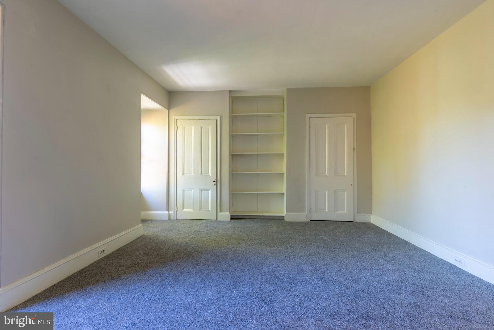 3604 Baring Street, Unit 2 Philadelphia, PA 19104 - Photo 17 of 22 an empty room with closet area