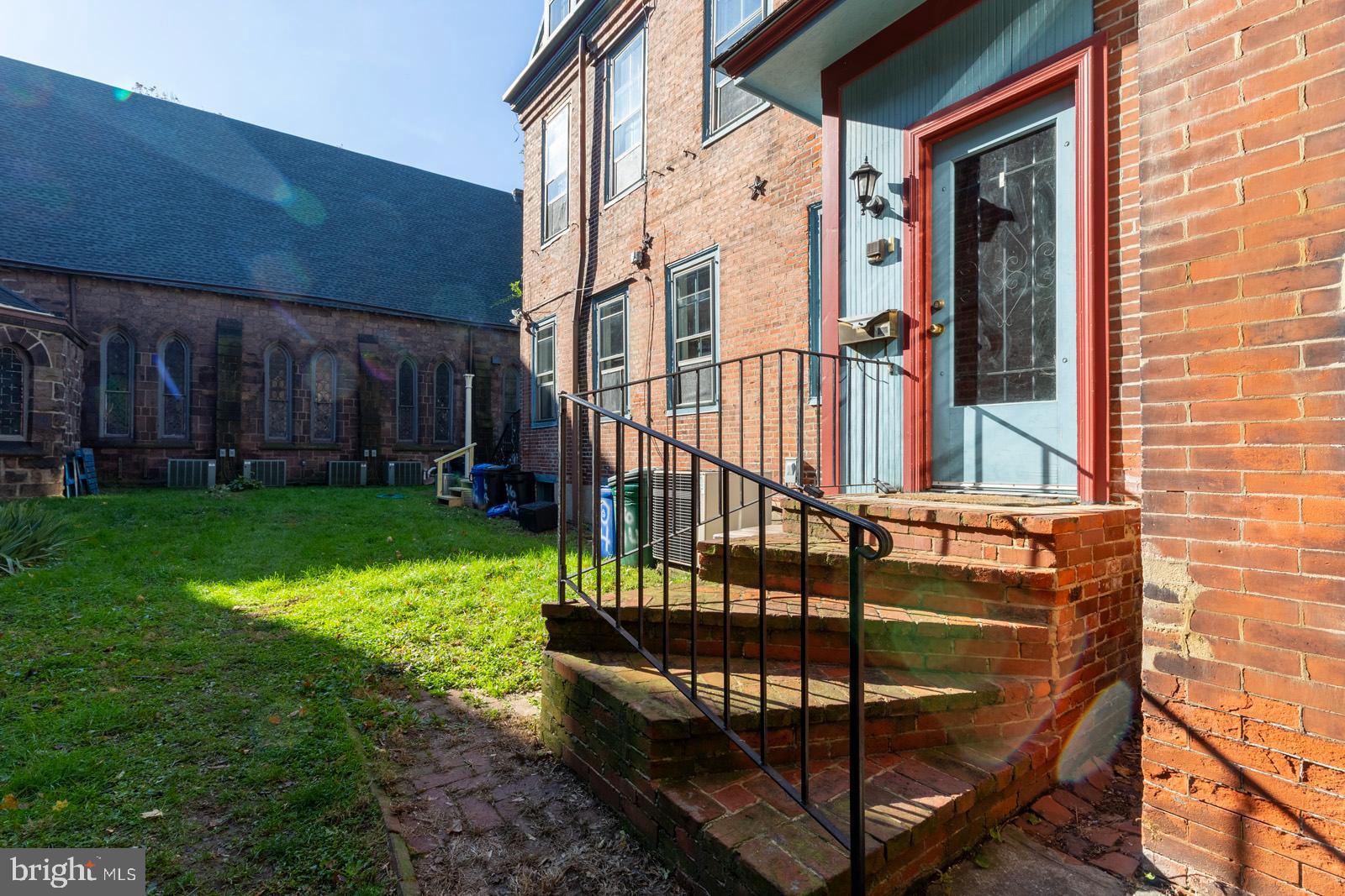 3604 Baring Street, Unit 2 Philadelphia, PA 19104 - Photo 21 of 22 a view of a backyard with a deck