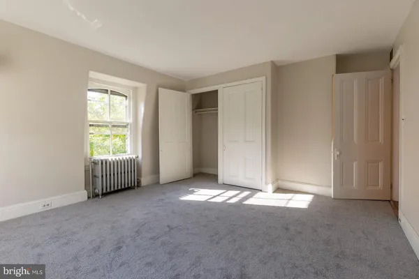 a view of an empty room with window