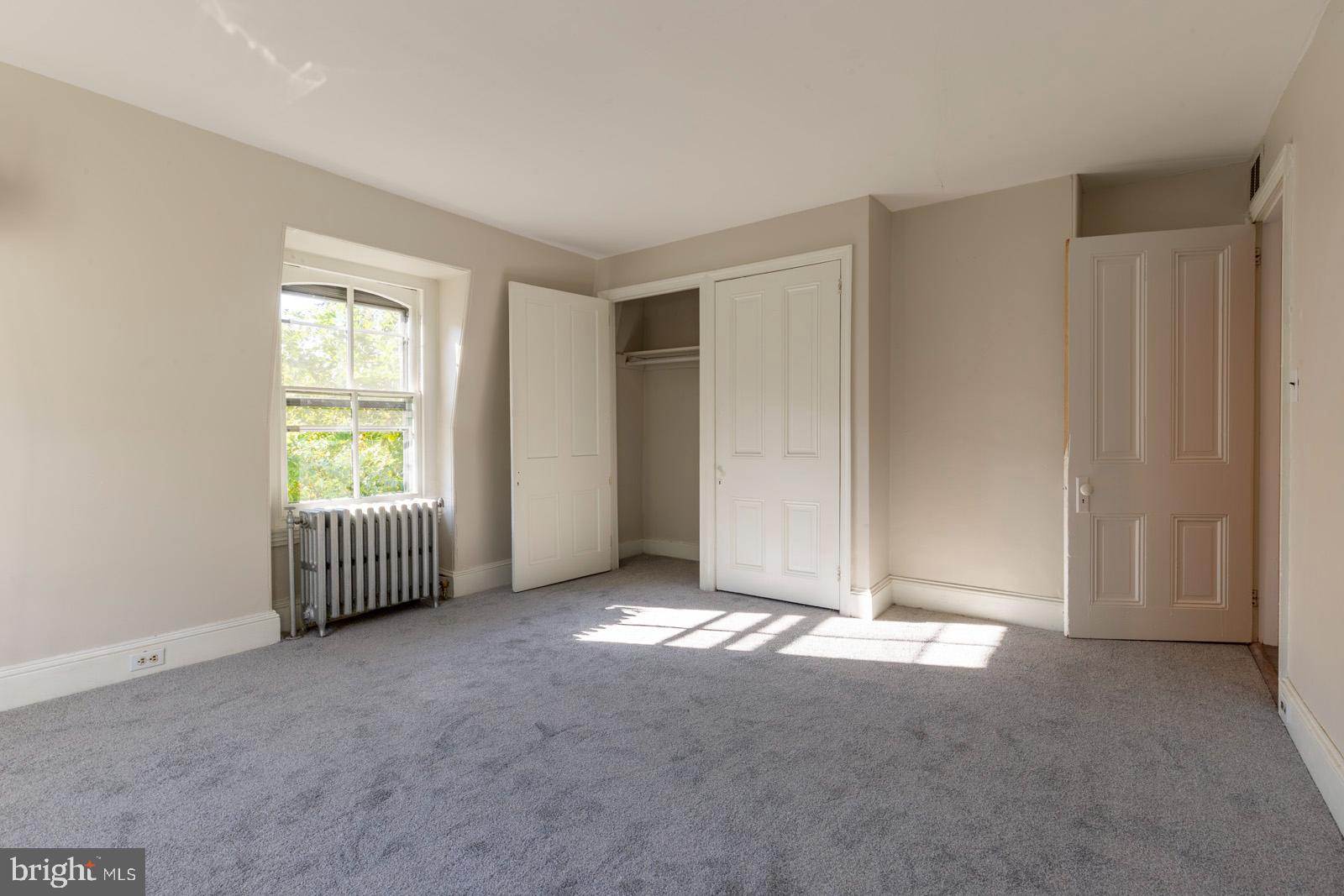 3604 Baring Street, Unit 2 Philadelphia, PA 19104 - Photo 7 of 25 a view of an empty room with window