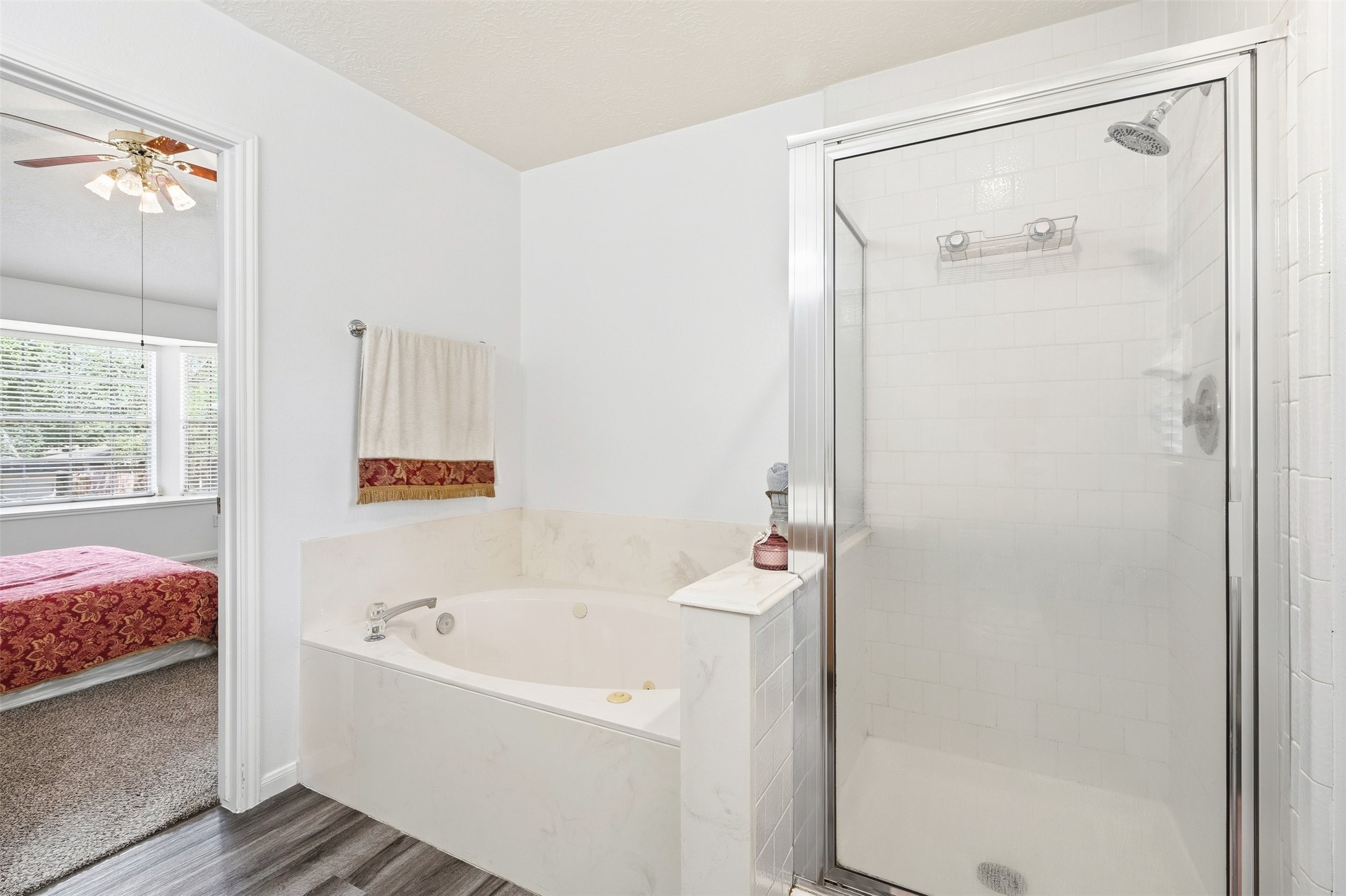 28723 Sedgefield Street Spring, TX 77386 - Photo 13 of 20 a bathroom with a bathtub and a shower