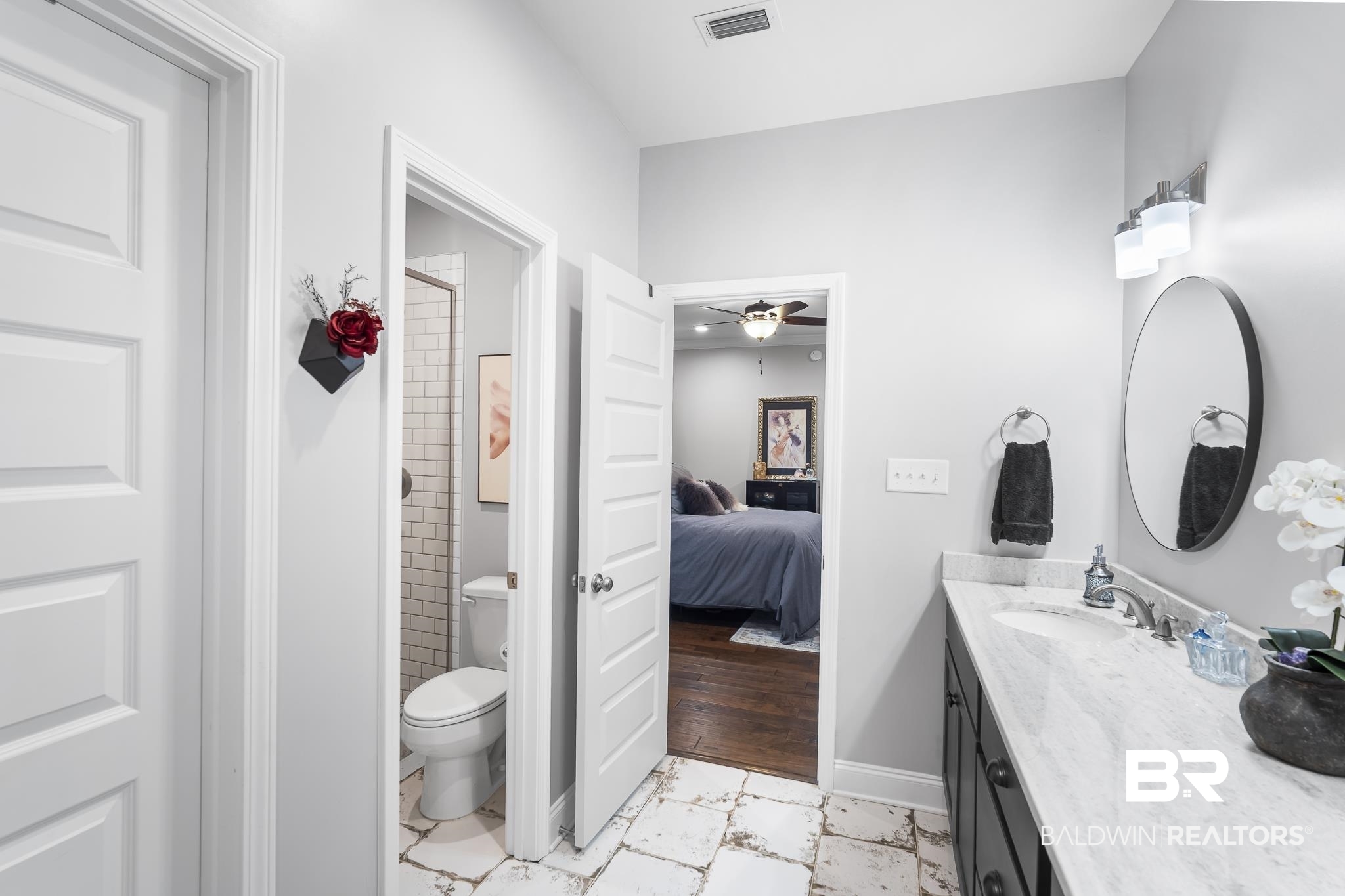 113 Timberline Drive Daphne, AL 36526 - Photo 21 of 44 Ensuite bathroom with vanity, a shower stall, and ceiling fan