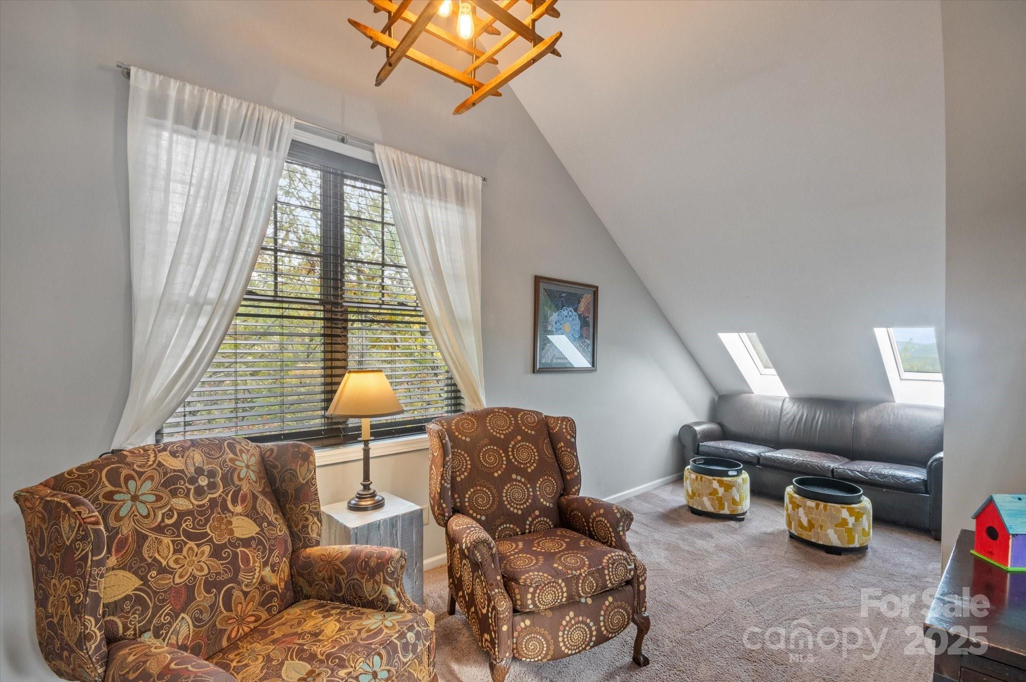 94 Davey Crockett Road Fairview, NC 28730 - Photo 19 of 41 a living room with furniture and a window