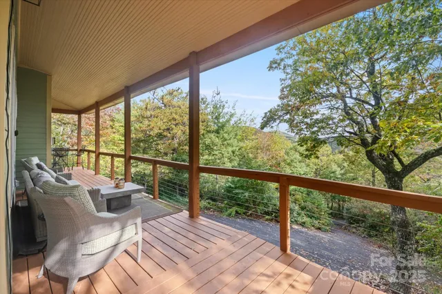 a view of balcony with furniture