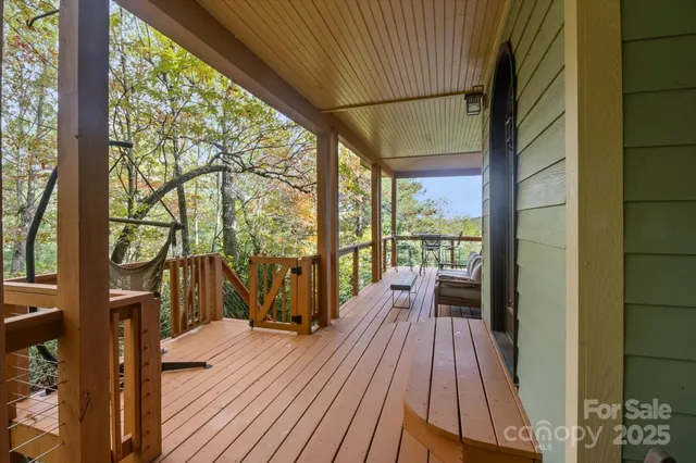 a view of balcony with wooden floor