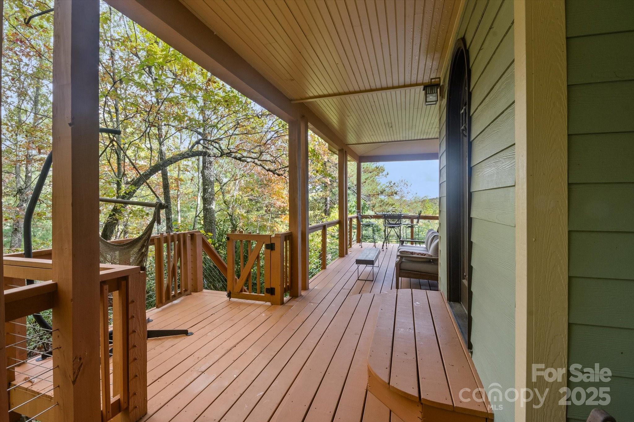 94 Davey Crockett Road Fairview, NC 28730 - Photo 3 of 41 a view of balcony with wooden floor