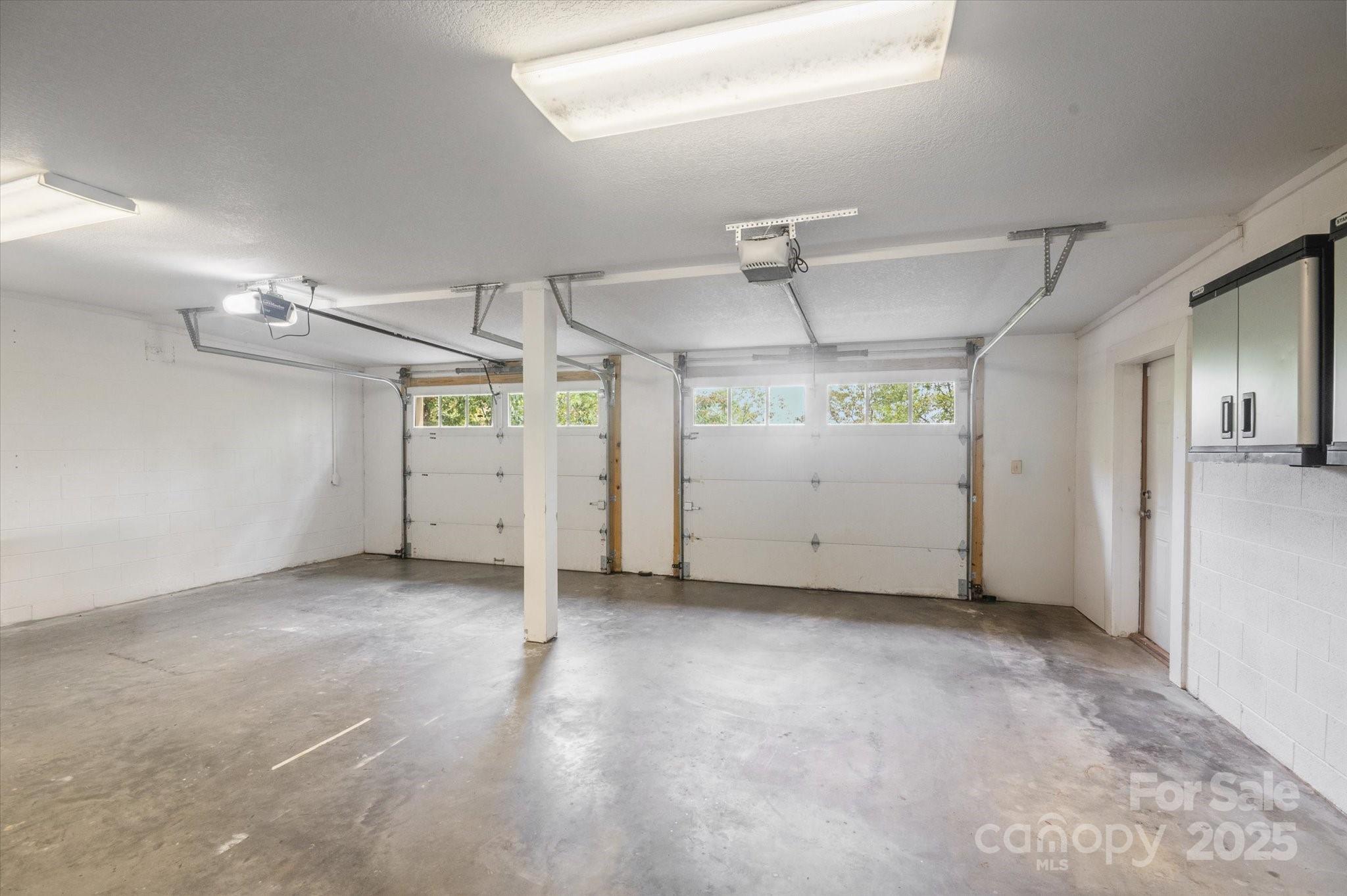 94 Davey Crockett Road Fairview, NC 28730 - Photo 31 of 41 an empty room with windows