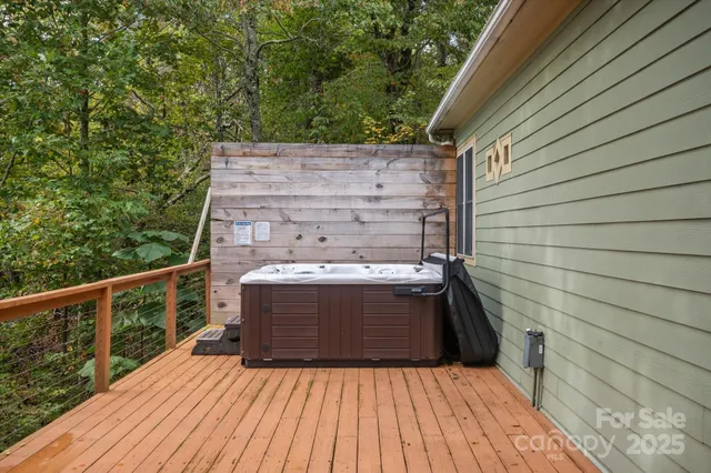 a view of balcony with wooden floor