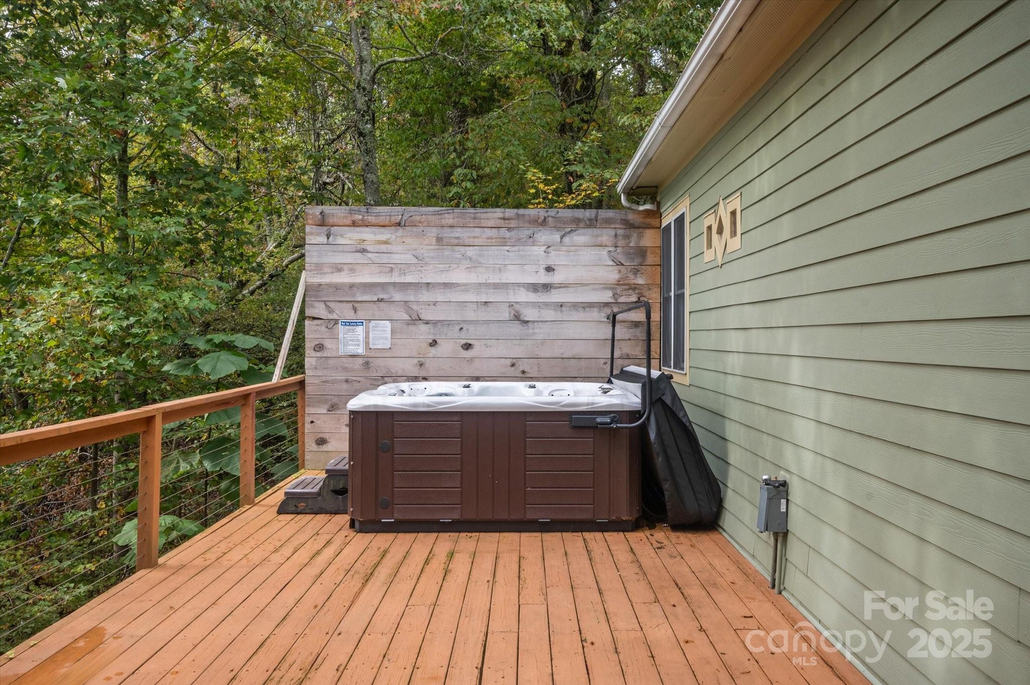94 Davey Crockett Road Fairview, NC 28730 - Photo 35 of 41 a view of balcony with wooden floor