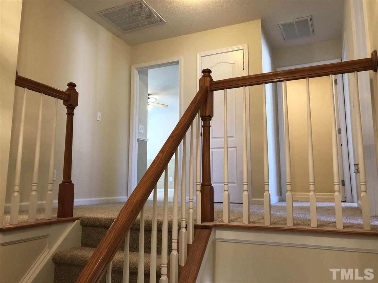 2844 Orchard Trace Way Raleigh, NC 27610 - Photo 5 of 9 Upstairs landing leaves room for "play area" and easy access to all four bedrooms.