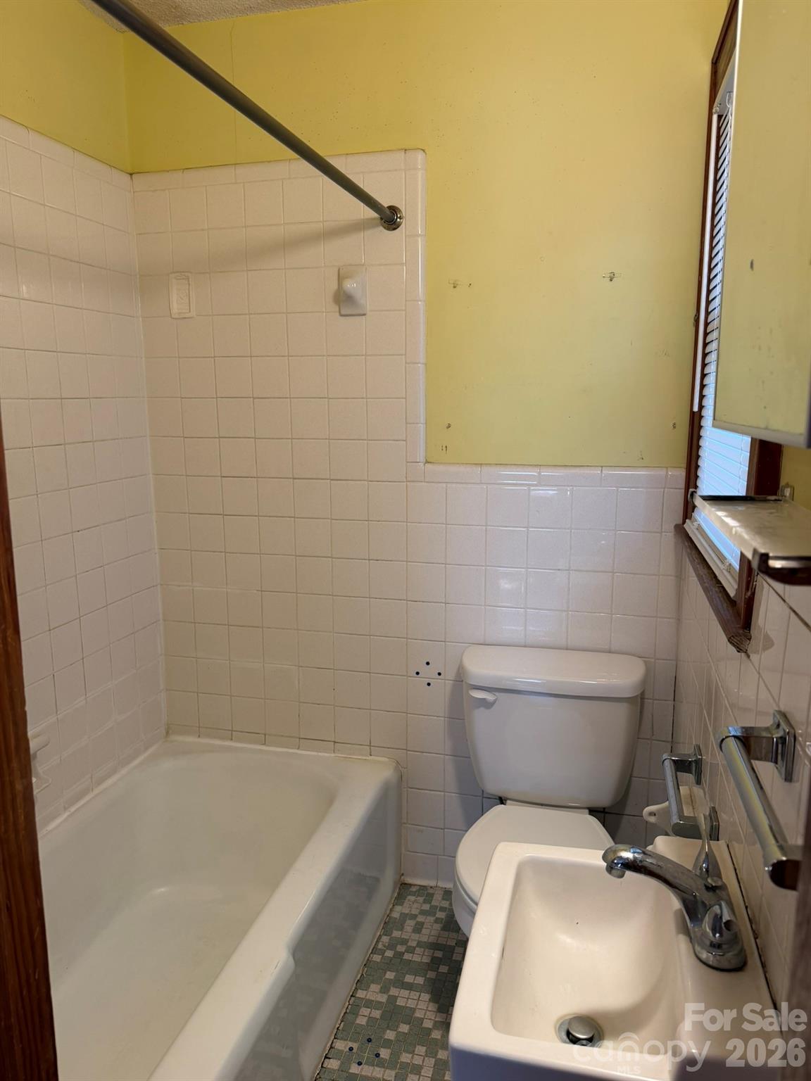 382 Alexis High Shoals Road Dallas, NC 28034 - Photo 23 of 43 a bathroom with a sink a toilet and bathtub