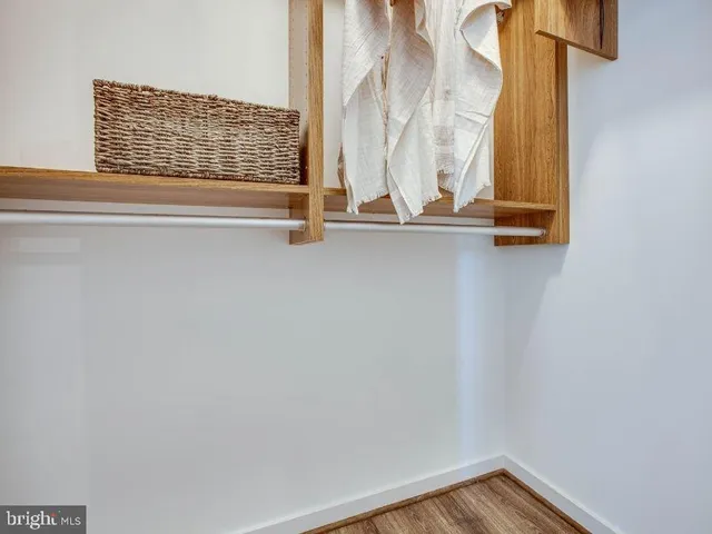 a view of walk in closet with window