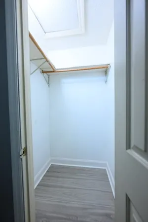 a view of an empty walk in closet