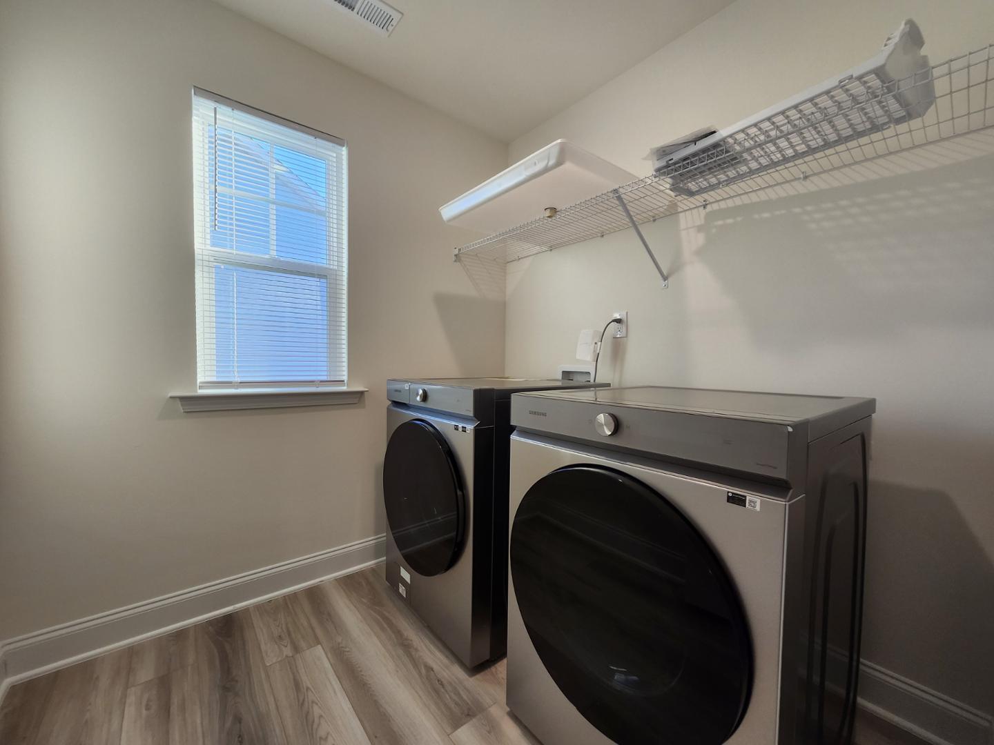1224 Weavers Trce Drive Zebulon, NC 27597 - Photo 18 of 21 a utility room with dryer and washer