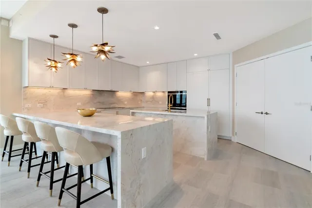 a living room with a couch and a flat screen tv
